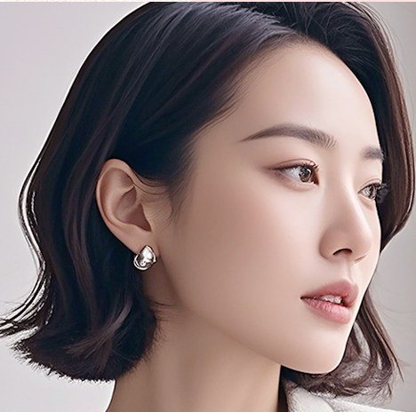 단발머리 여성의 옆모습 클로즈업 사진